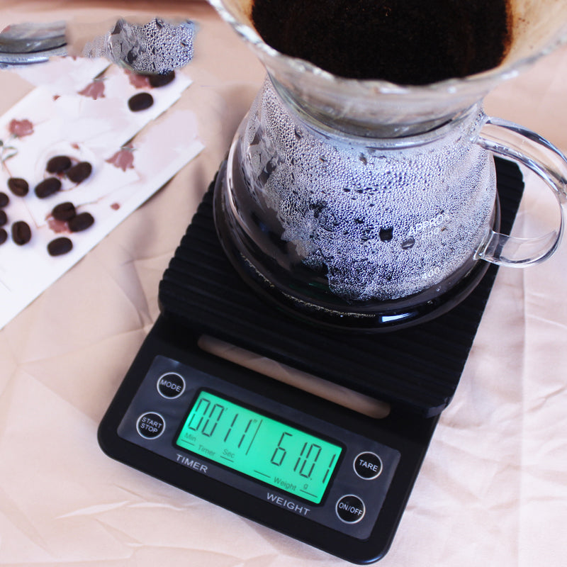 Coffee scale weighing pour-over brew