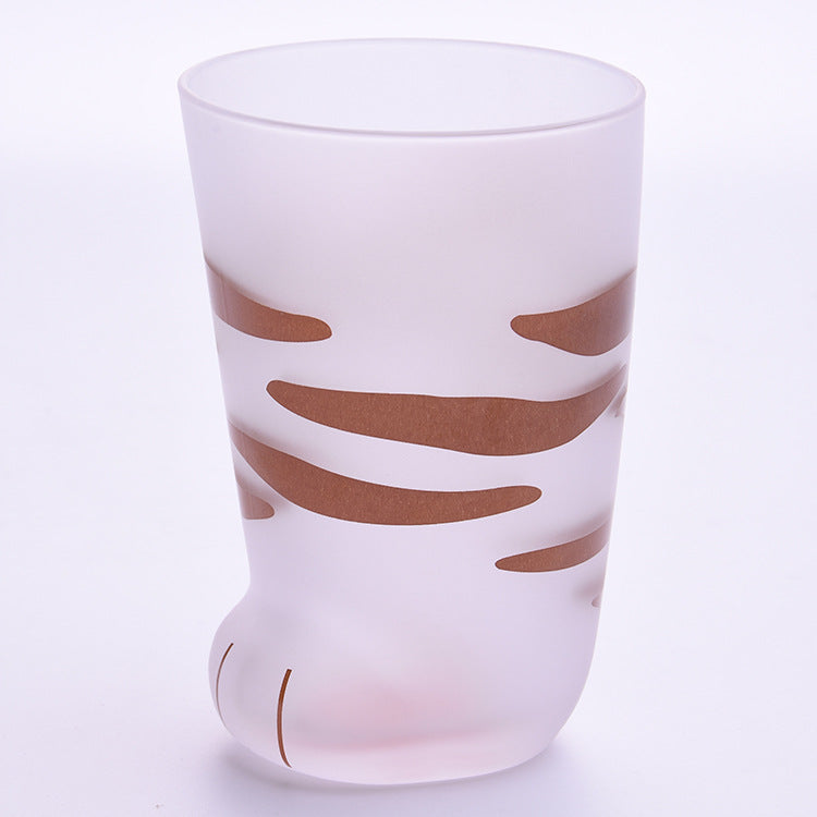 Cat paw glass mug with iced coffee — lifestyle view