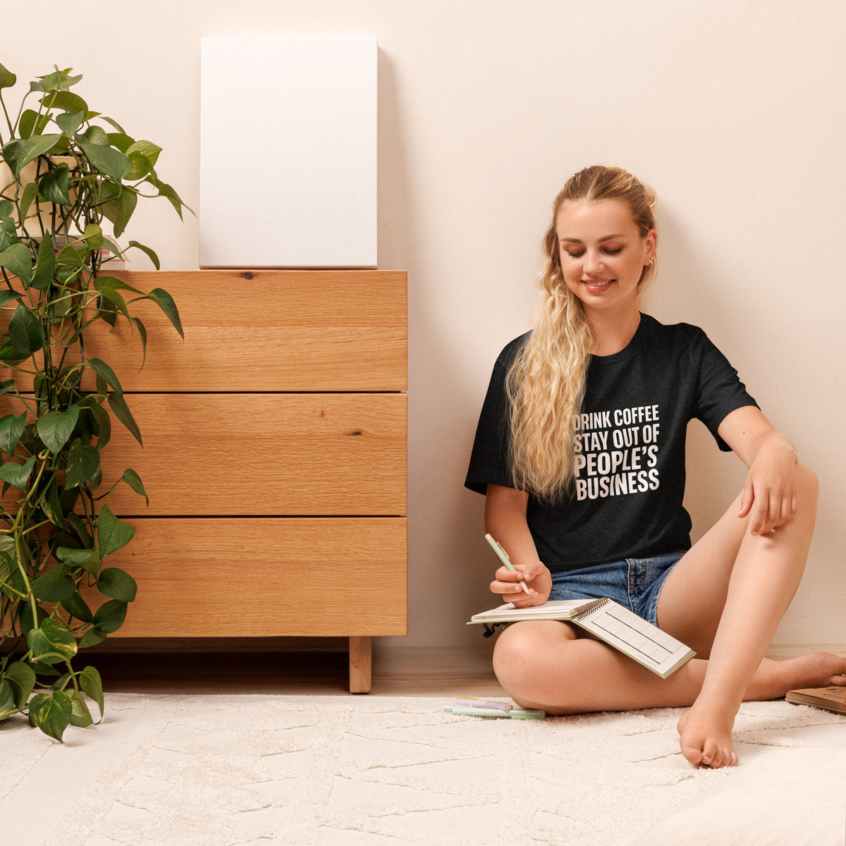 Drink Coffee, Stay Out of People's Business classic tee in Black Heather, front, close-up on model